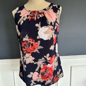 Women’s Tahari sleeveless blouse. Colors navy, red, and white)